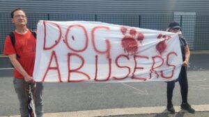 Protestors with banner